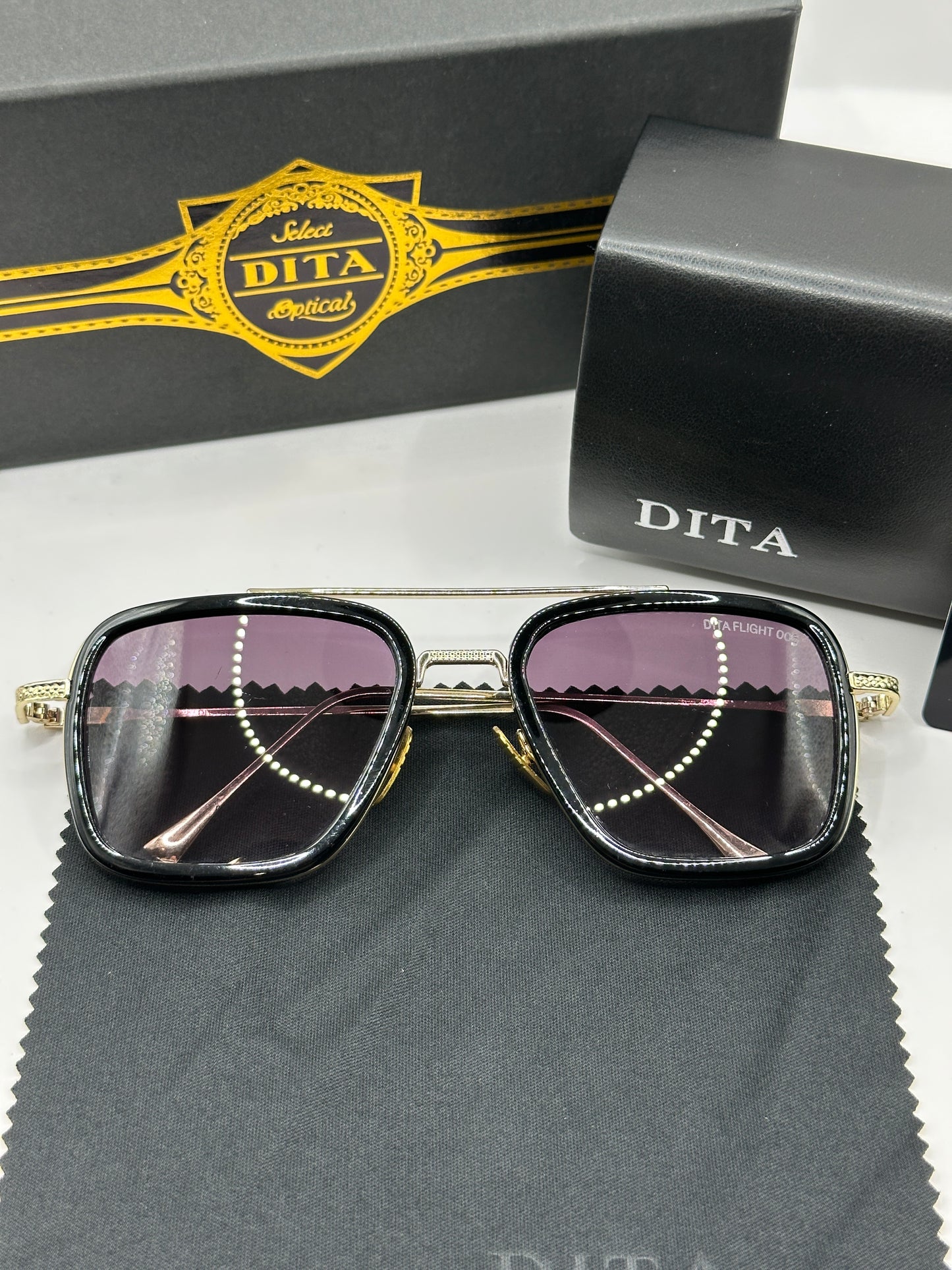 Dita Sonnenbrille in Gold mit lilafarbene Gläser D3