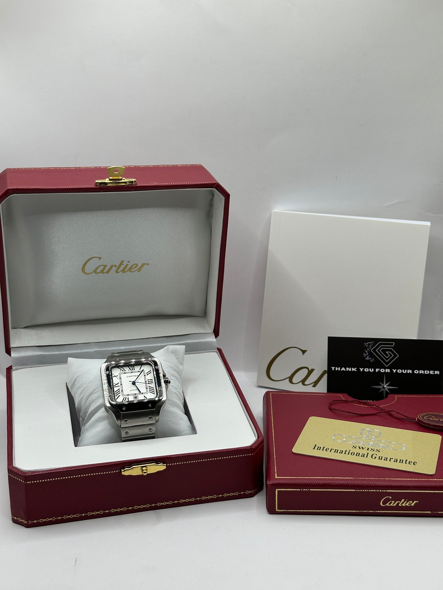 Cartier Santos, 40mm Stahl, weißes Zifferblatt mit römischen Ziffern - Automatik + Box & Papiere