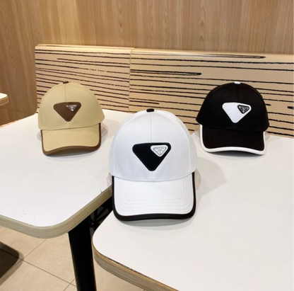 PRADA MACRO TRIANGLE PATCH BASEBALL CAP – BEIGE / WHITE / BLACK – HIGH END
