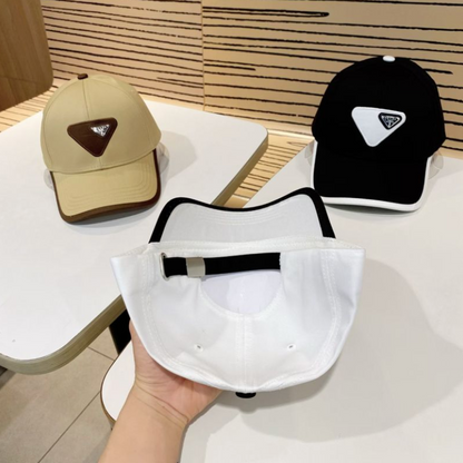 PRADA MACRO TRIANGLE PATCH BASEBALL CAP – BEIGE / WHITE / BLACK – HIGH END