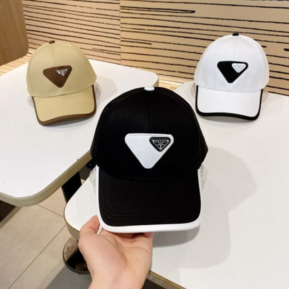 PRADA MACRO TRIANGLE PATCH BASEBALL CAP – BEIGE / WHITE / BLACK – HIGH END
