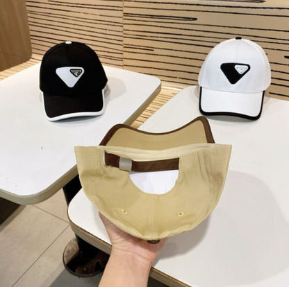 PRADA MACRO TRIANGLE PATCH BASEBALL CAP – BEIGE / WHITE / BLACK – HIGH END