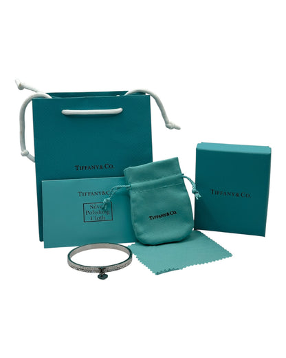 Tiffany & Co. Armreif mit Zirkonia & Herz-Anhänger, Silber