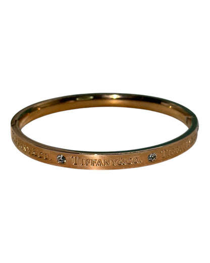Tiffany & Co. Klassisches Armband mit Logogravur in Roségold
