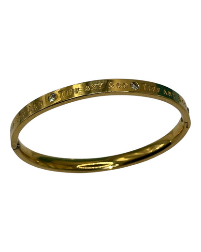 Tiffany & Co. Klassisches Armband mit Logogravur in Gold