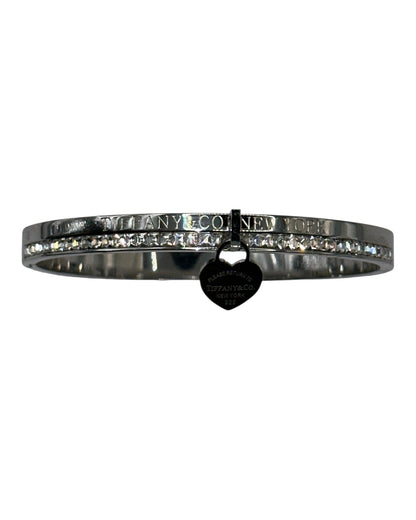 Tiffany & Co. Armreif mit Zirkonia & Herz-Anhänger, Silber