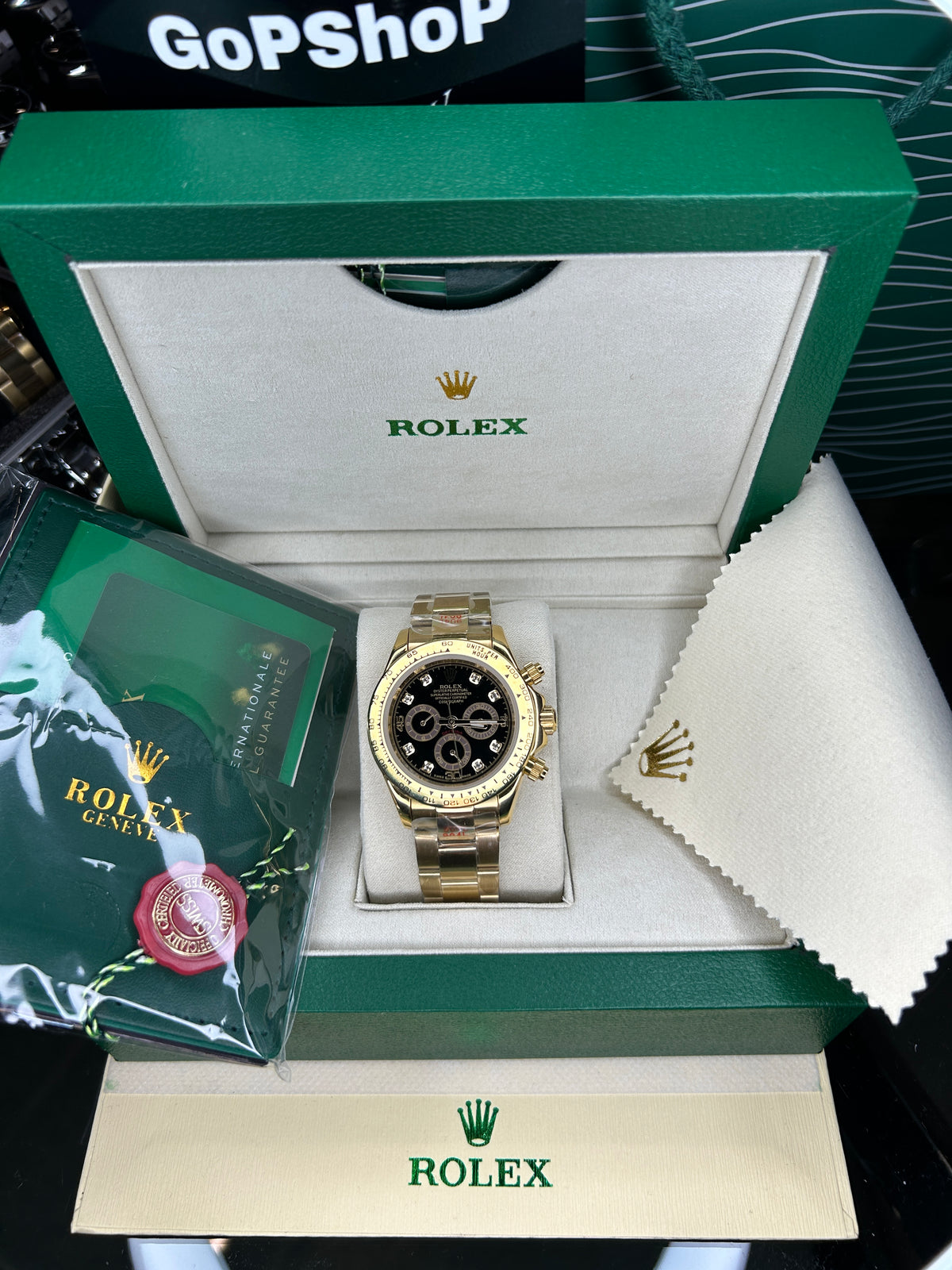 ROLEX DAYTONA GOLD BLACK DIAL WITH DIAMONDS - OYSTER