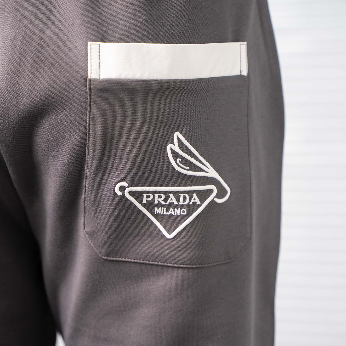 PRADA 2025SS INVERTED TRIANGLE CONTRAST POCKET TRACK PANTS – 1:1 HIGH END
